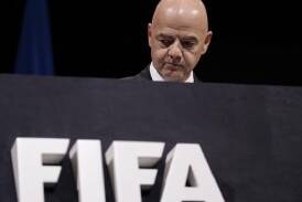 Gianni Infantino says FIFA will seek independent legal advice on a proposal to suspend Israel. (AP PHOTO)